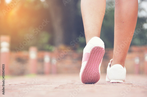 Wallpaper Mural Training, people and lifestyle concept Women legs with shoes and sun. Torontodigital.ca