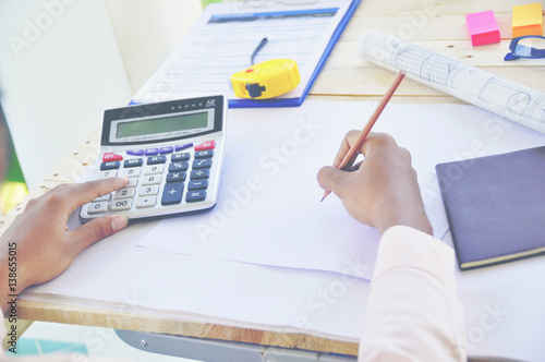 Wallpaper Mural Architect drawing on architectural project business, architecture, building, construction and people concept - close up of architect hands with compass measuring living house blueprint Torontodigital.ca