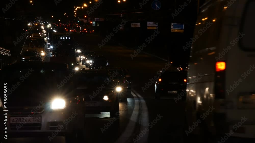 Night highway with traffic jam and emergency car Night highway with traffic jam and emergency car