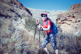 Hiking and leisure theme. Adventure people on hike hiking in nature