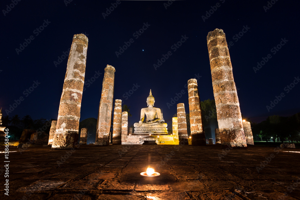 Buddha Statue at Wat Mahathat, buddha temple, in Sukhothai Historical Park, Sukhothai, Thailand Buddha Statue at Wat Mahathat, buddha temple, in Sukhothai Historical Park, Sukhothai, Thailand