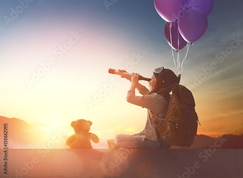 Young traveller with backpack photo