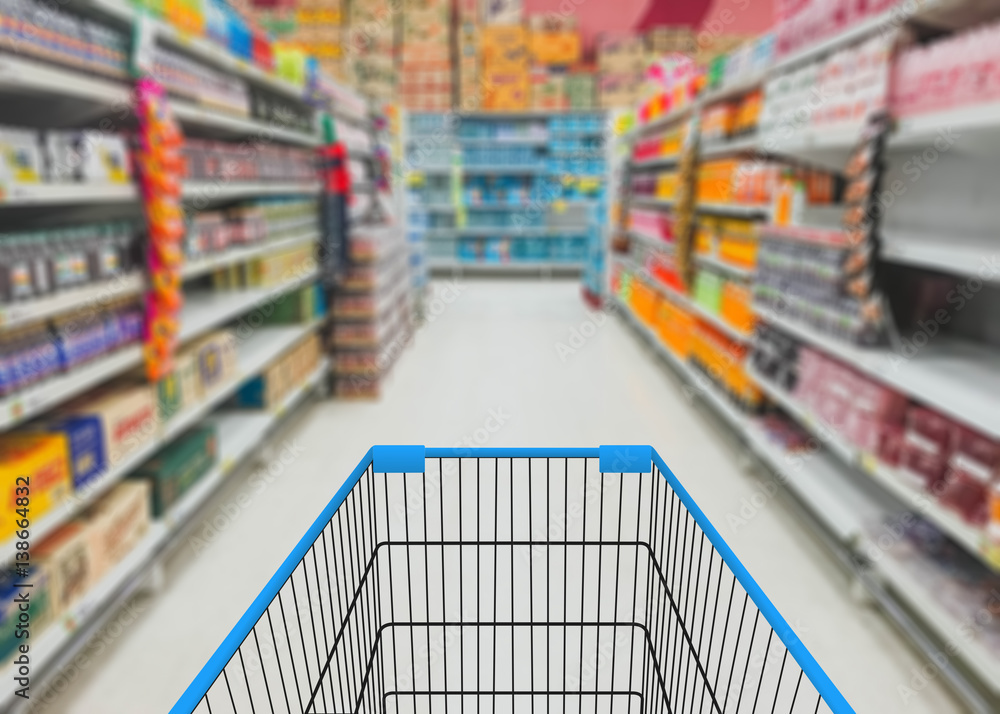 Abstract blurred photo of store with trolley in department store background