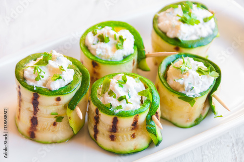 Grilled zucchini rolls stuffed with cheese