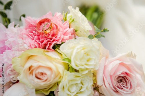 Beautiful bridal bouquet with wedding rings