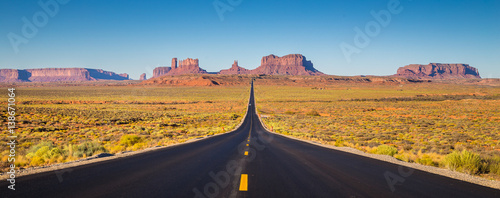 Monument Valley with U.S. Highway 163 at sunset, Utah, USA photo