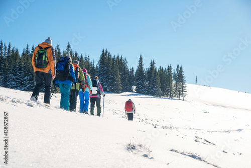 Tourist team in the mountains, teamwork, sports, lifestyle concept