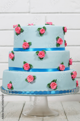 Fototapeta Naklejka Na Ścianę i Meble -  Blue three-tiered cake