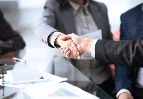 Business partnership meeting concept. Image businessmans handshake. Successful businessmen handshaking after good deal. Horizont