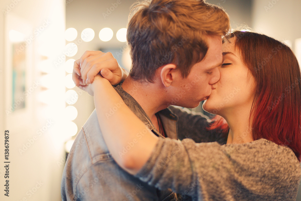 Romantic couple touching and kissing each other Romantic couple touching and kissing each other