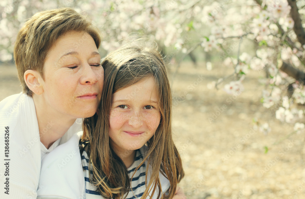 Happy mother and daughter outdoors. Mother day. Happy mother and daughter outdoors. Mother day.