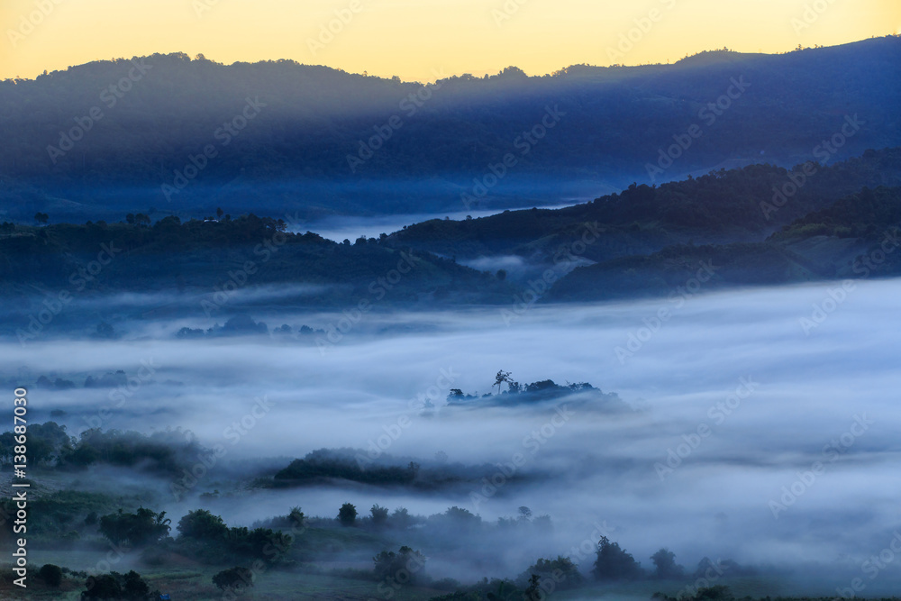 Beautiful Sunrise of travel place with morning mist at Phu Langka National Park in Phayao Province, Thailand