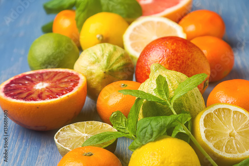 Citrus juice fruit and slices of orange, grapefruit, lemon, lime