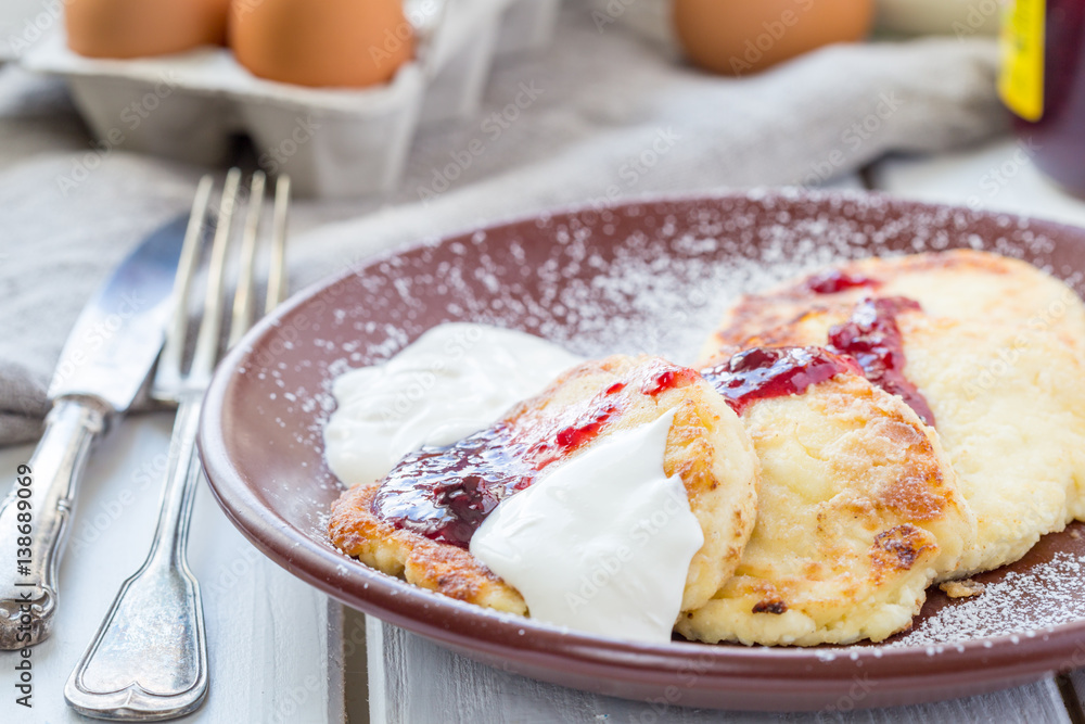 Cottage Cheese Pancakes with Strawberry Jam and Cream, Horizontal View