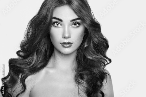 Portrait of young beautiful girl. Fashion photo. Hairstyle. Make up. Vogue Style. Black and white photo.