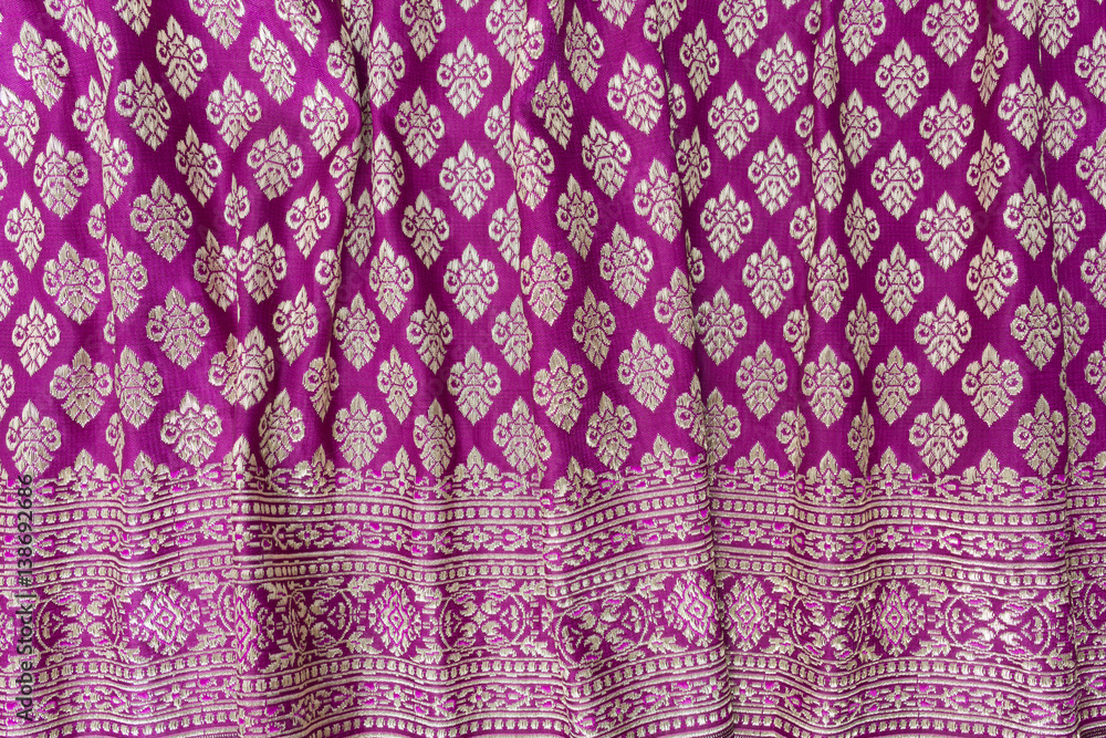 Vertical striped crumpled Thai silk textile.