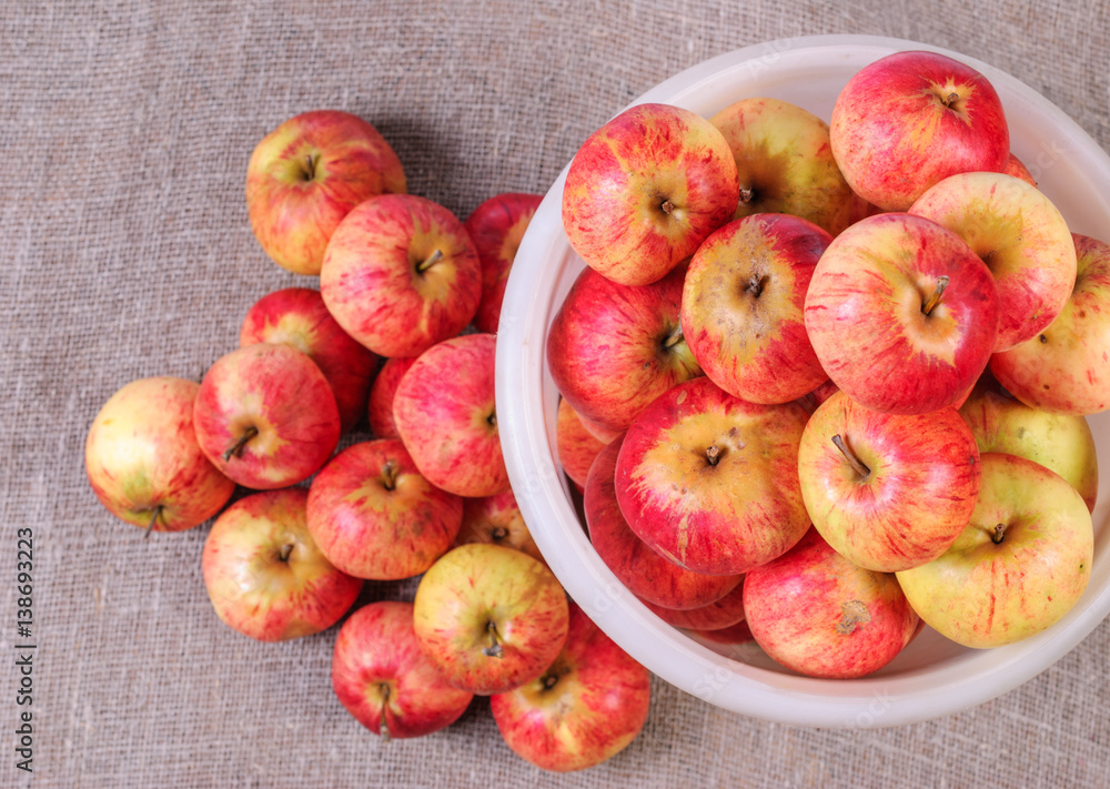 White bucket with red apples. View from above White bucket with red apples. View from above