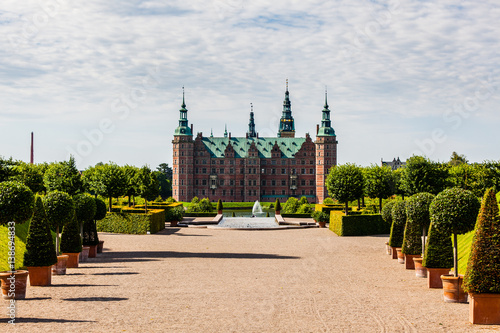 The majestic castle Frederiksborg Castle seen from the beautiful park area,