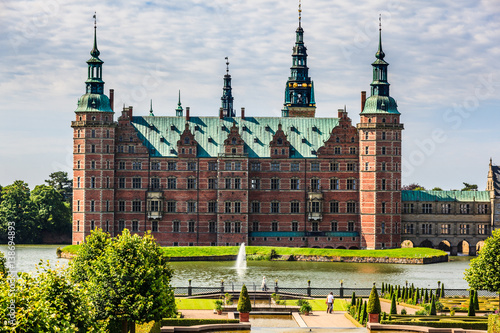 The majestic castle Frederiksborg Castle seen from the beautiful park area,