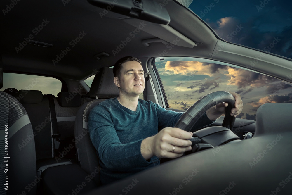 Man rides in car