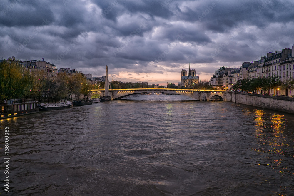 River Seine in Paris, France at dusk, in autumn.