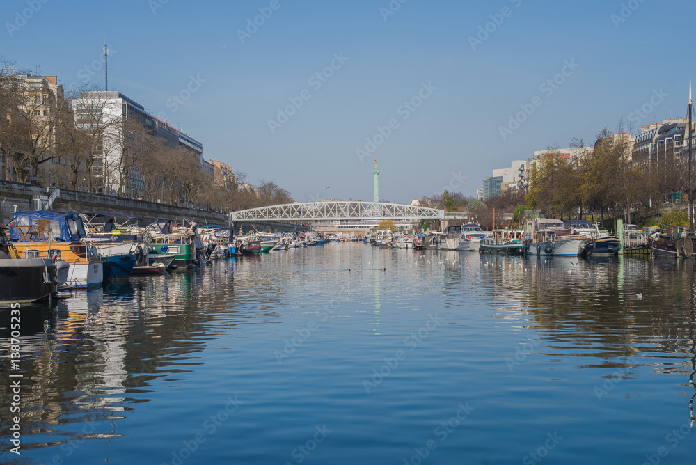 Paris, Bastille, harbor, houseboats and view on statue 