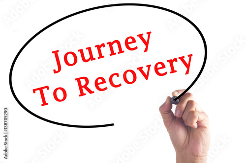 Hand writing Journey To Recovery on transparent board