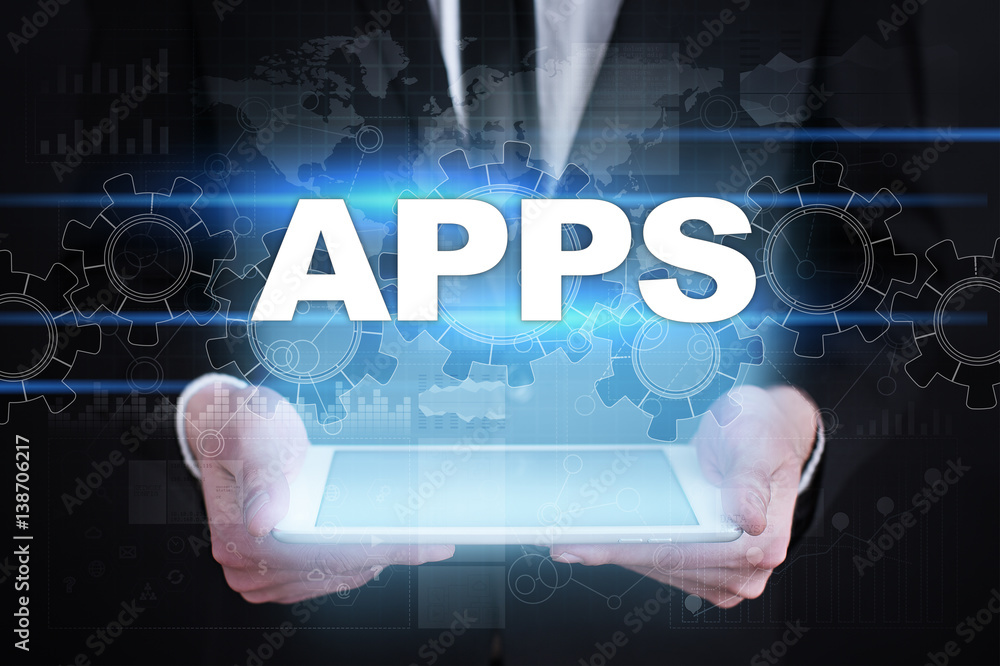 Businessman holding tablet PC with apps concept. Businessman holding tablet PC with apps concept.