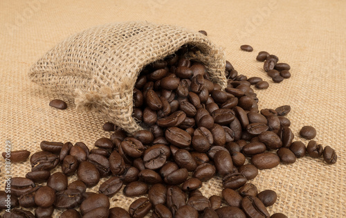 Coffee beans in small burlap sack © Venus