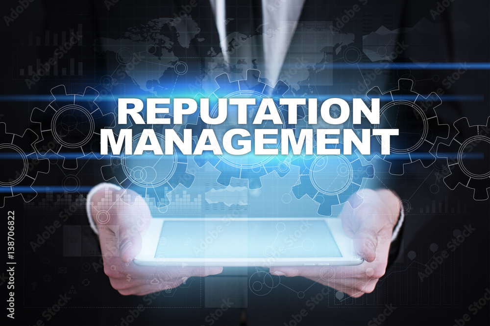 Businessman holding tablet PC with reputation management concept. Businessman holding tablet PC with reputation management concept.