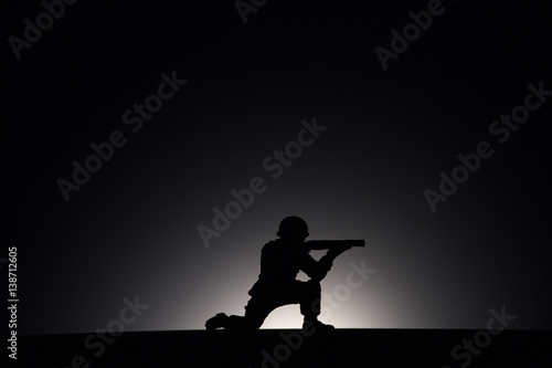 Silhouette Of A Soldier on a dark background