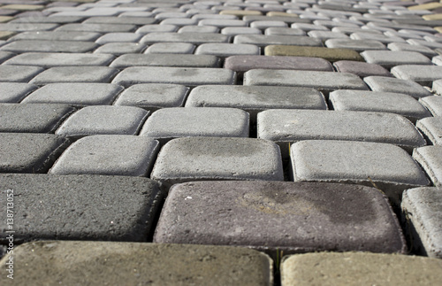 Background of cobble stone road making from cement blocks