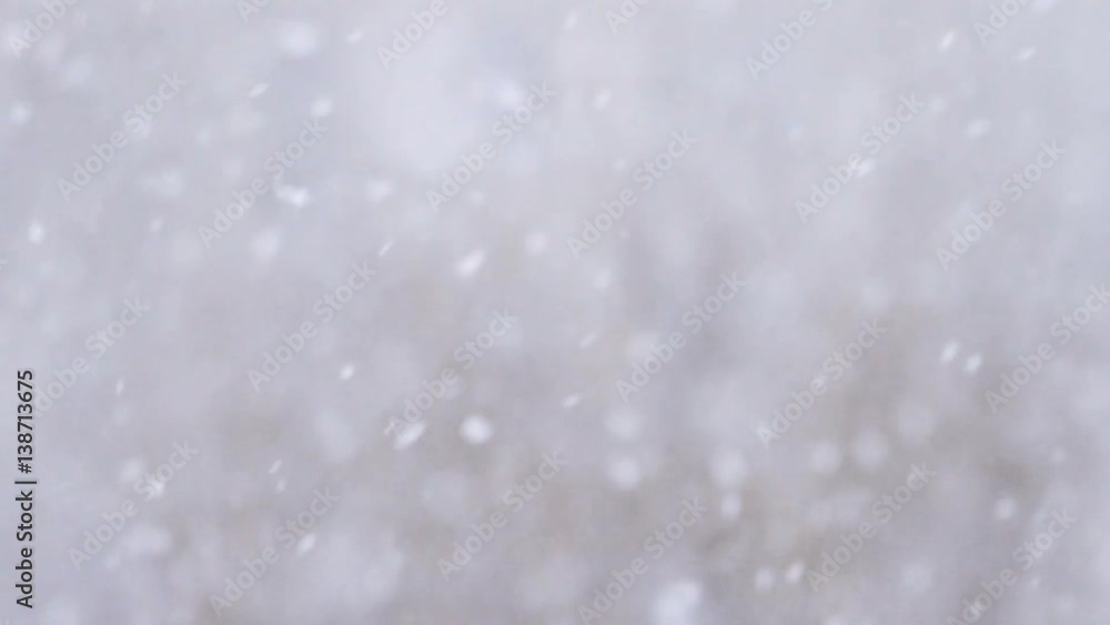 Slow motion background of snow fall blowing fast in winter daytime Slow motion background of snow fall blowing fast in winter daytime