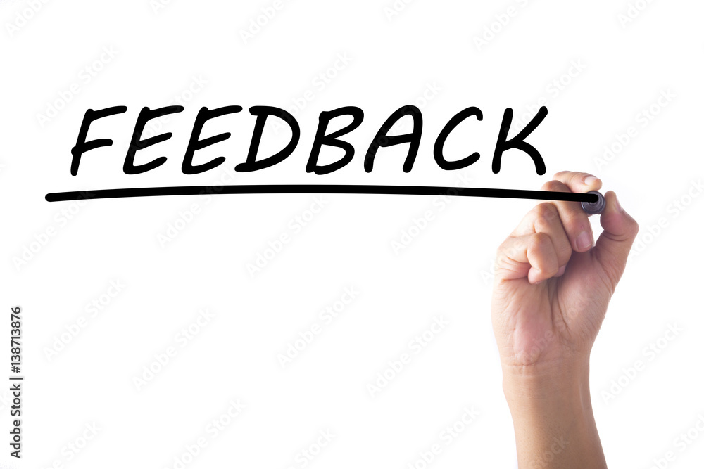 Hand writing FEEDBACK on transparent board Hand writing FEEDBACK on transparent board