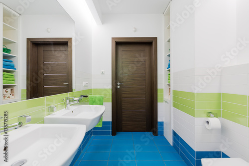 Modern bathroom with blue floor