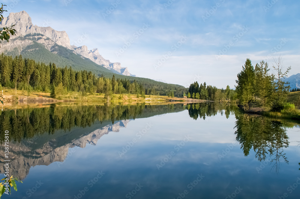 Canmore Alberta, Quarry Lake, Reflection of Mount Rundle.