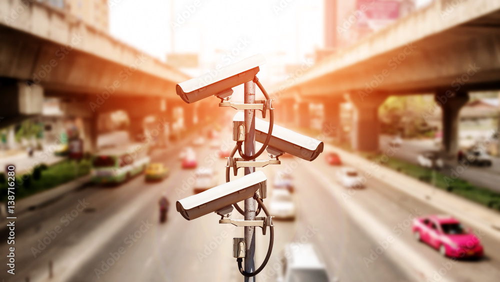 Closeup of traffic security camera surveillance (CCTV) in the big city.