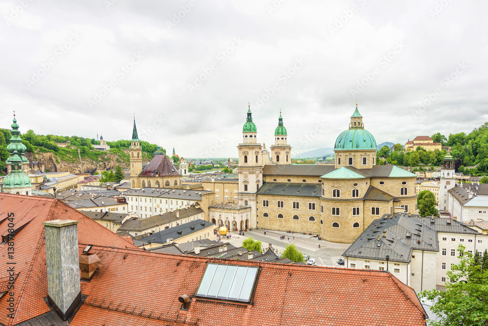 Panoramic view over stadt salzburg, rainy day, fog and mountains, austria