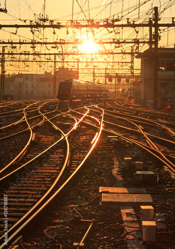 Sunrise over the railroad tracks at Perrache station in Lyon, France.