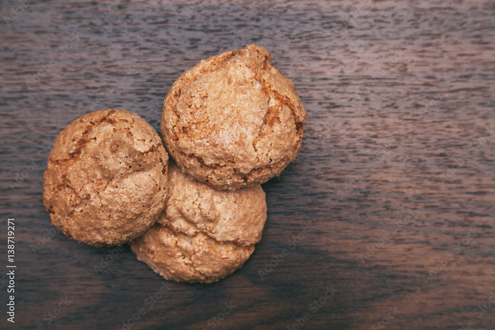 sweet cookies lie on a wooden background sweet cookies lie on a wooden background