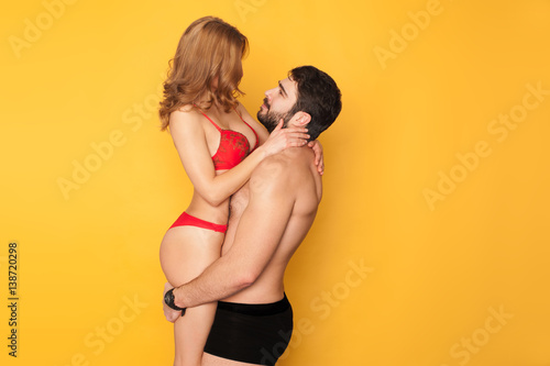 Photo of a young hot couple in lingerie