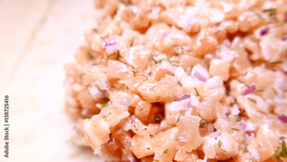 Fresh tasty Salmon Fish sliced with onion. 4K UHD Fresh tasty Salmon Fish sliced with onion. 4K UHD