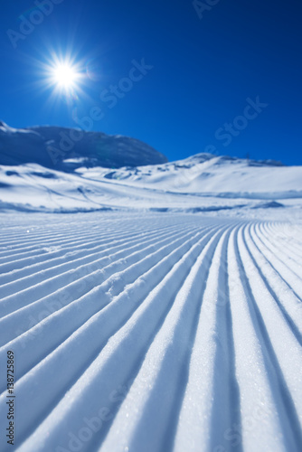 Ski track in snow as abstract background