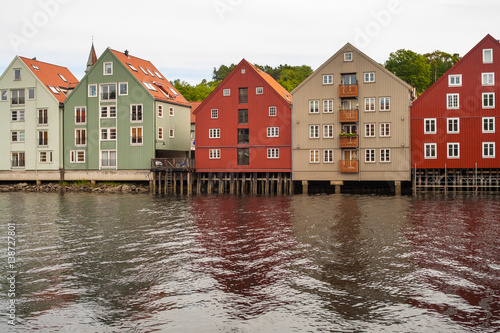 View from bridge to famous wooden colored houses in Trondheim. Norway.