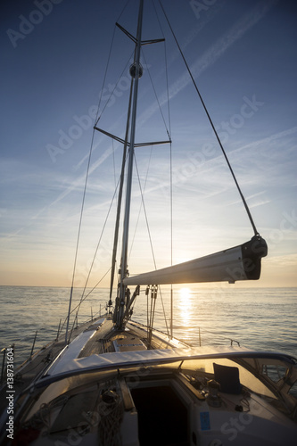Luxury Yacht Sailing In Sea During Sunset © Tyler Olson