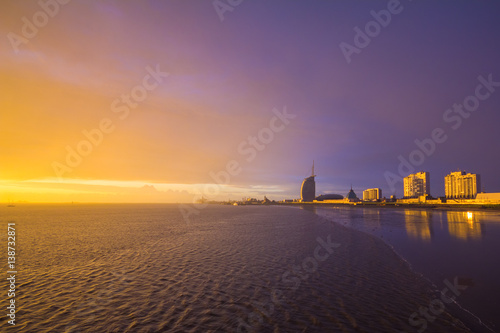 Bremerhaven. Waterfront of Bremerhaven with skyline and harbour after rainstorm at sunset.
