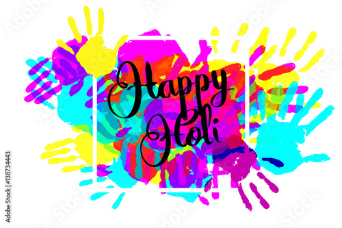 Happy holi on a background of hand prints