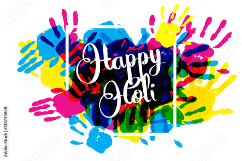 Happy holi on a background of hand prints