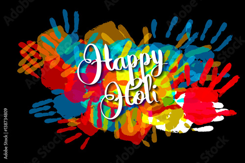 Happy holi on a background of hand prints