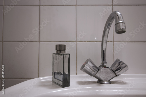 Bathroom water tap and cologne